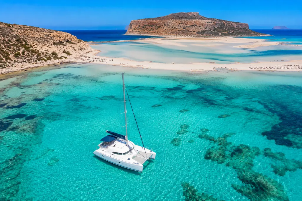lagoon 380 in balos lagoon aerial photo